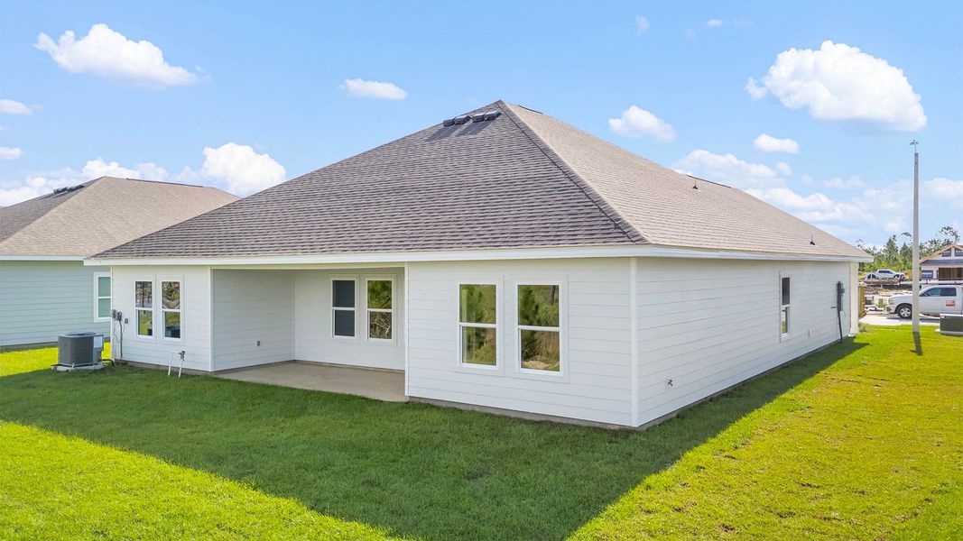 Front exterior of a new home in Liberty, Panama City, FL, highlighting curb appeal (Image 19).