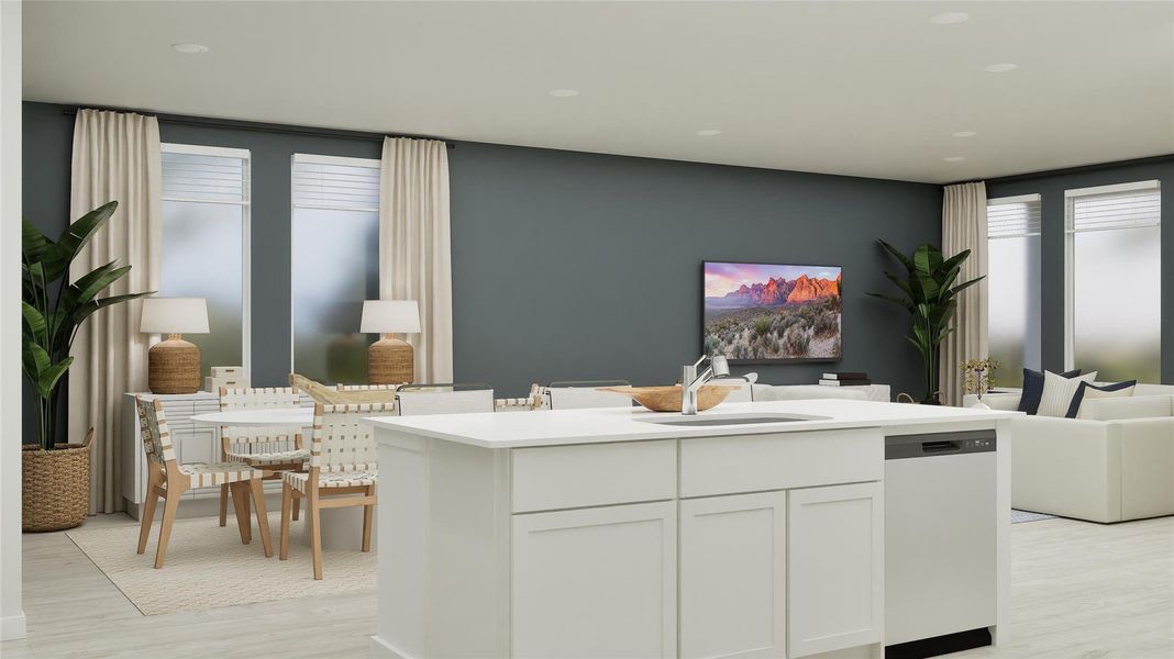 Kitchen with white cabinetry, white dishwasher, light wood finished floors, open floor plan, and a kitchen island with sink Kitchen with white cabinetry, white dishwasher, light wood finished floors, open floor plan, and a kitchen island with sink