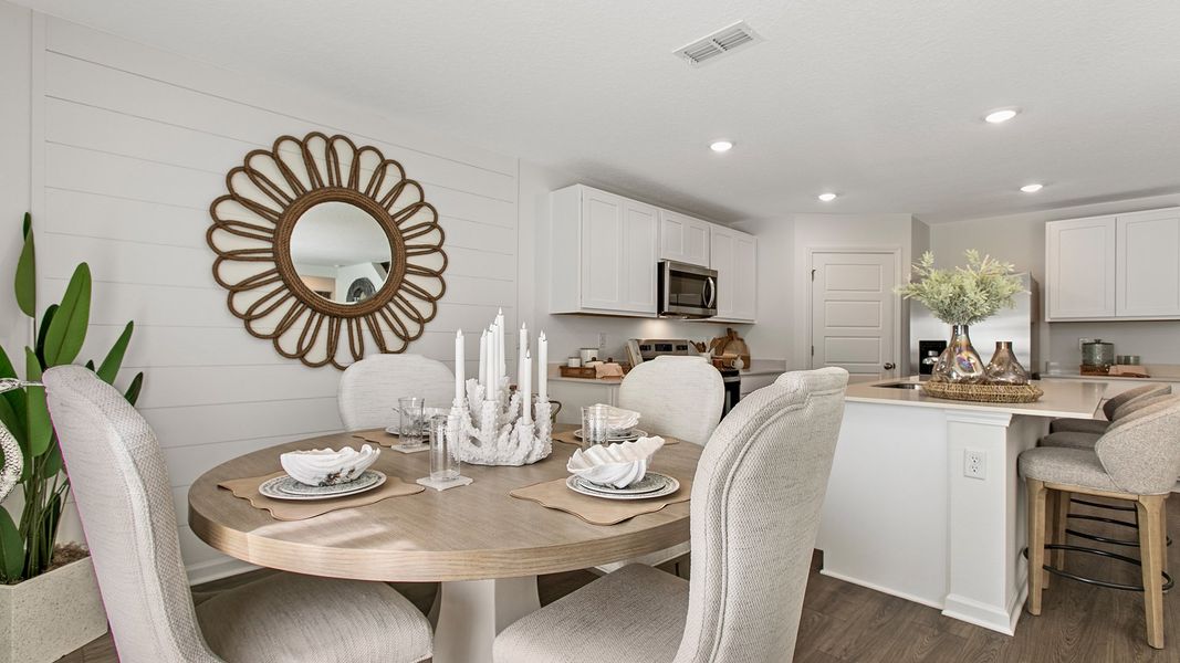 Representative furnished interior of a home built from the HAYDEN II by D.R. Horton in Copes Landing, Jacksonville (Image 11).