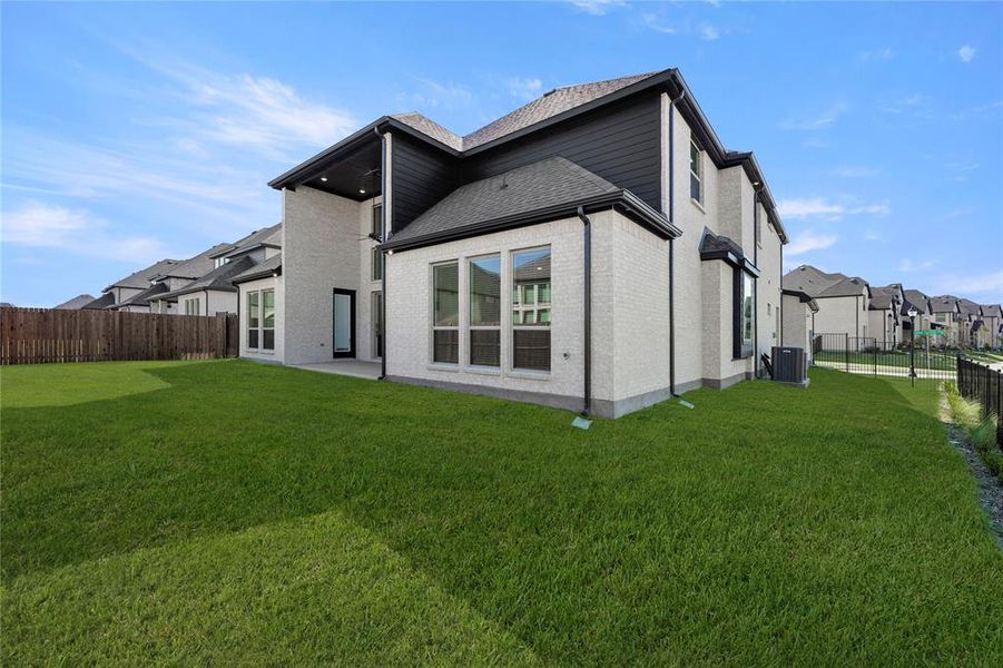 Exterior details and patio area of a home in Collinsbrook Farm, Frisco (Image 3).