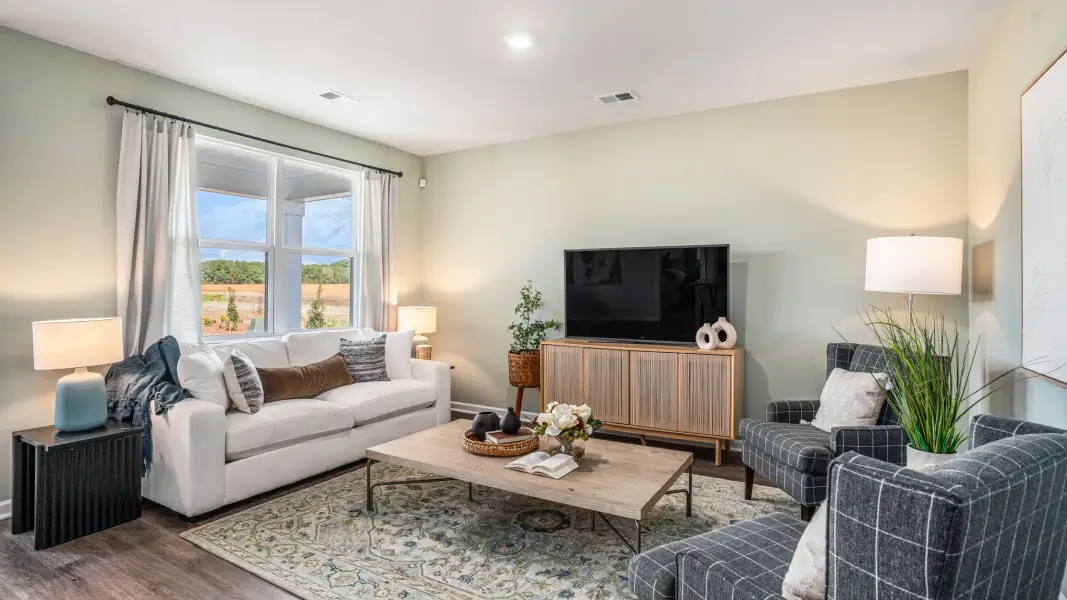 Representative furnished interior of a home built from the Aria by D.R. Horton in Maple Grove, Conway (Image 4). Representative furnished interior of a home built from the Aria by D.R. Horton in Maple Grove, Conway (Image 4).