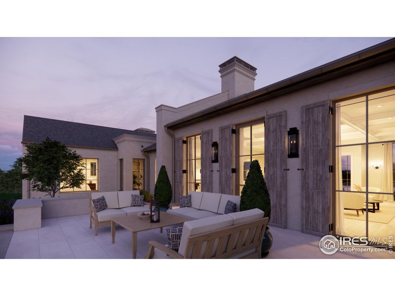 Nearly 700 square foot patio with tiered garden beds, perfect for entertaining.