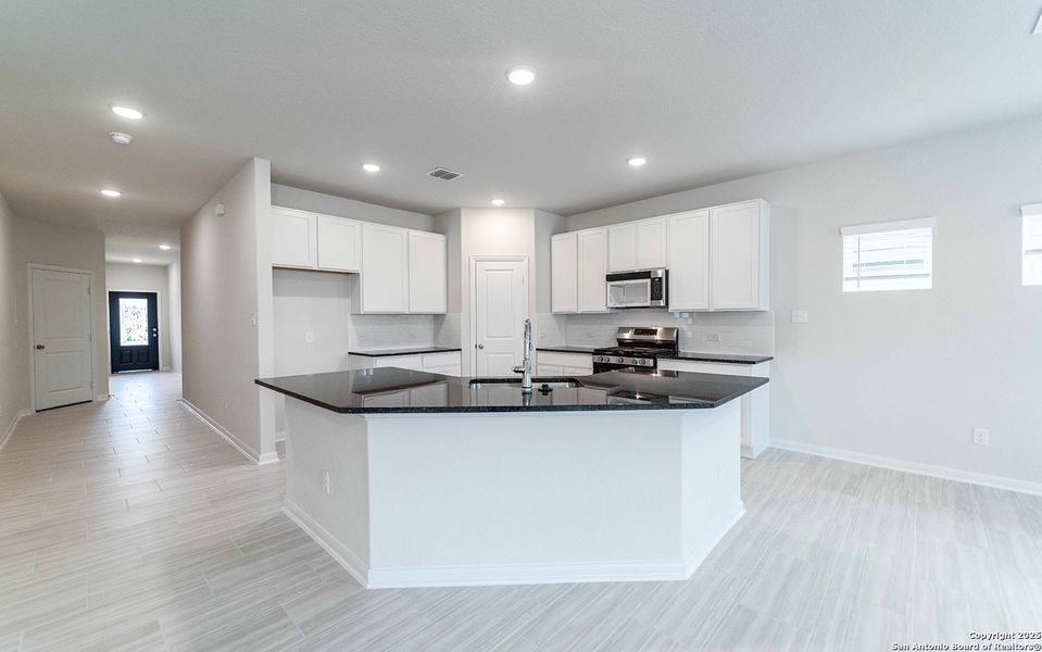 Furnished interior view inside a new home in Hickory Ridge, Elmendorf (Image 3).