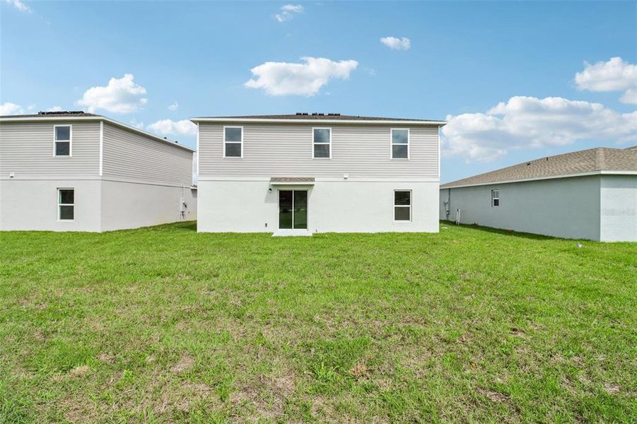 Exterior details and patio area of a home in Sumter Villas, Sumterville (Image 3).