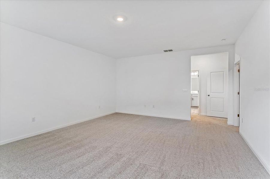 Spacious, unfurnished interior of a new home in Serenade at Ovation, Winter Garden (Image 12). Spacious, unfurnished interior of a new home in Serenade at Ovation, Winter Garden (Image 12).