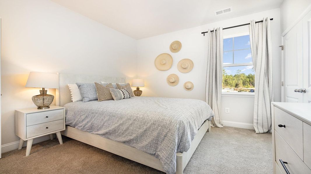 Furnished interior view inside a new home in Pine Hills at Cane Bay, Summerville (Image 3).
