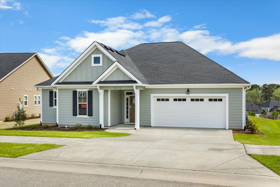 Front exterior of a new home in Sinclair at Crawford Creek, Grovetown, GA, highlighting curb appeal (Image 21). Front exterior of a new home in Sinclair at Crawford Creek, Grovetown, GA, highlighting curb appeal (Image 21).