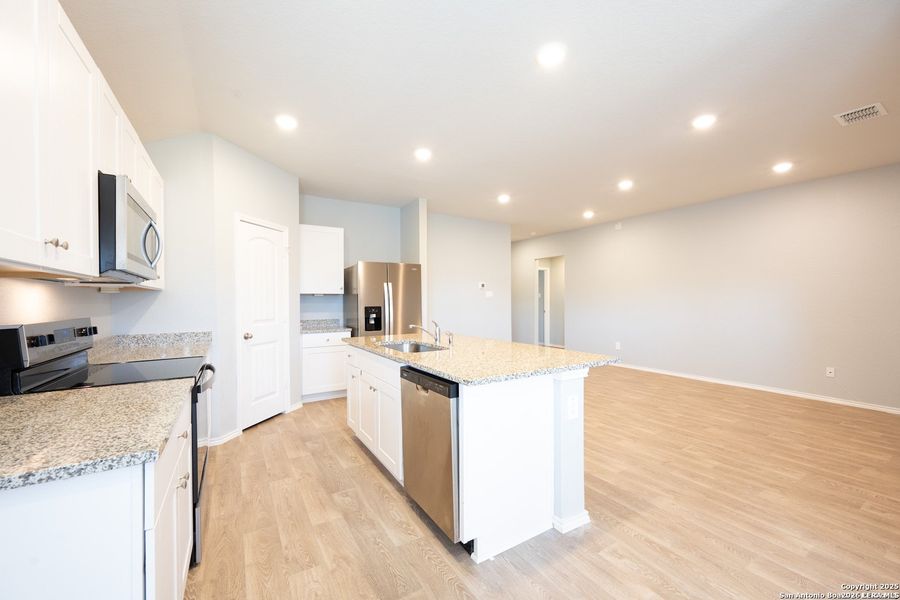Furnished interior view inside a new home in , Seguin (Image 7).