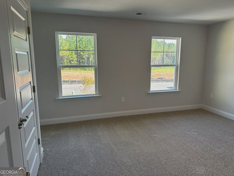 Spacious, unfurnished interior of a new home in Canterbury Villas, Carrollton (Image 14).