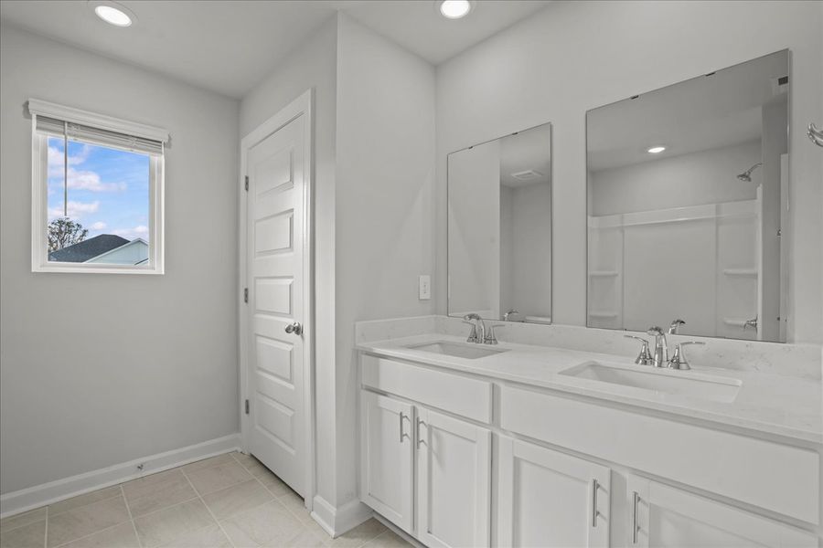 Furnished interior view inside a new home in The Farm at Wells Creek - Signature Collection, Gray Court (Image 5).