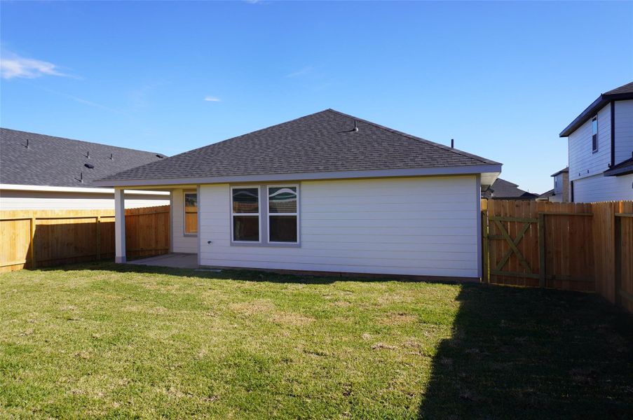 Exterior details and patio area of a home in , Fulshear (Image 14).