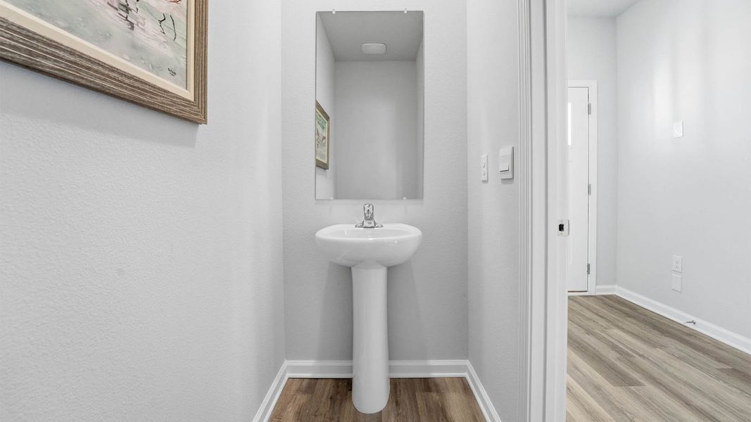 Representative furnished interior of a home built from the The Monroe by D.R. Horton in Chateau Nemours, Port Saint Joe (Image 18).