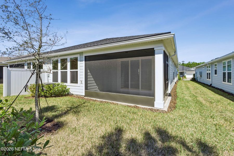 Exterior details and patio area of a home in Del Webb Wildlight, Wildlight (Image 21).