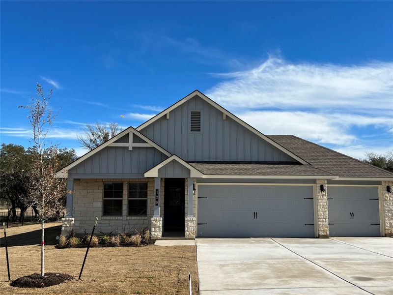 Front exterior of a new home in Delaware Springs, Burnet, TX, highlighting curb appeal (Image 1). Front exterior of a new home in Delaware Springs, Burnet, TX, highlighting curb appeal (Image 1).