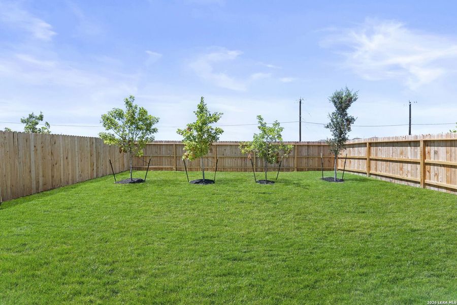 Exterior details and patio area of a home in Redbird Ranch, San Antonio (Image 2).