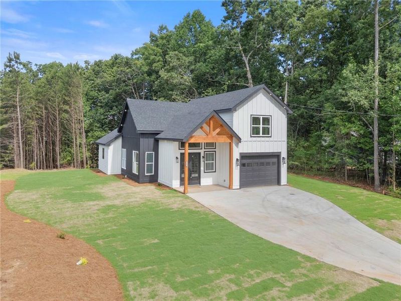 Front exterior of a new home in , Buford, GA, highlighting curb appeal (Image 18).