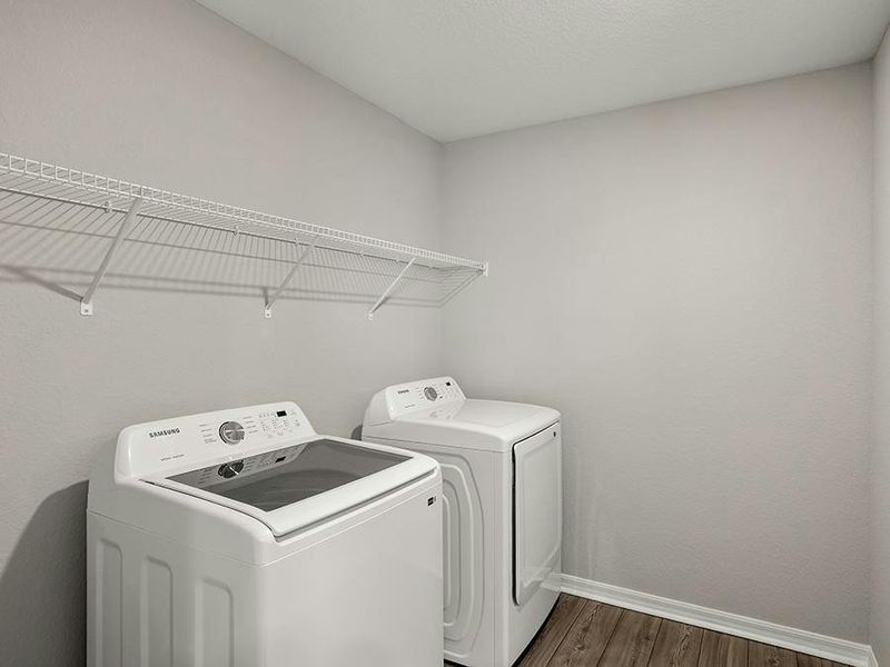 Plus, a dedicated laundry room is conveniently located near the bedrooms - Seabrooke ll by Highland Homes