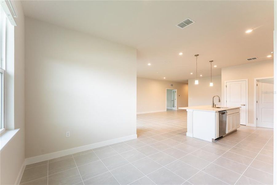 Spacious, unfurnished interior of a new home in The Palms at Venetian Bay, New Smyrna Beach (Image 12).