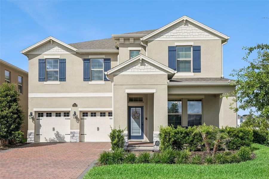 Front exterior of a new home in , Winter Garden, FL, highlighting curb appeal (Image 25).