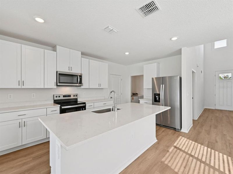 Furnished interior view inside a new home in Oakfield Trails - Premier Series, Parrish (Image 5).