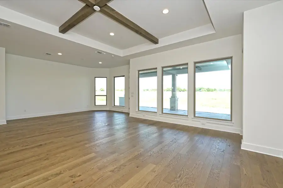 Representative unfurnished interior of a home built from the Llano II by Giddens Homes in Whispering Wind, Bertram (Image 101). Representative unfurnished interior of a home built from the Llano II by Giddens Homes in Whispering Wind, Bertram (Image 101).