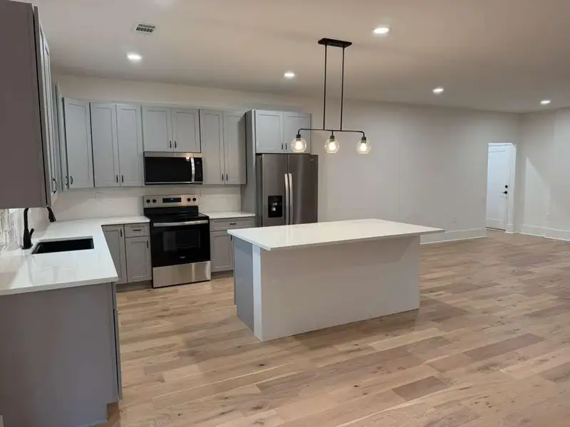 Furnished interior view inside a new home in , Monroe (Image 5).
