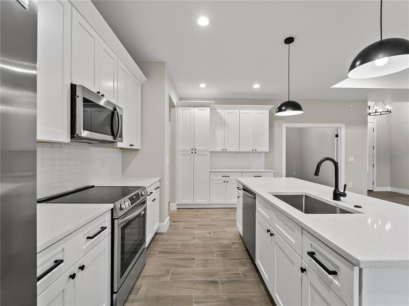 Furnished interior view inside a new home in , Port Charlotte (Image 9).