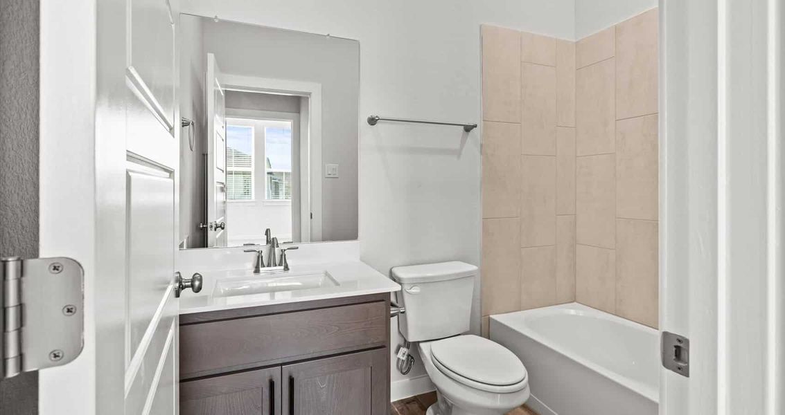 Furnished interior view inside a new home in Trace, San Marcos (Image 9).