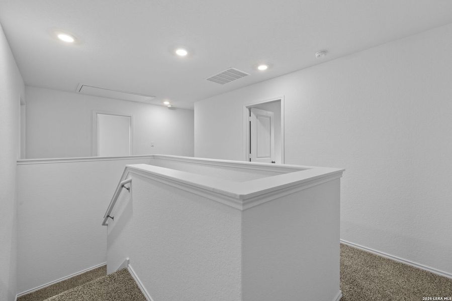 Furnished interior view inside a new home in Avenida, Converse (Image 11).