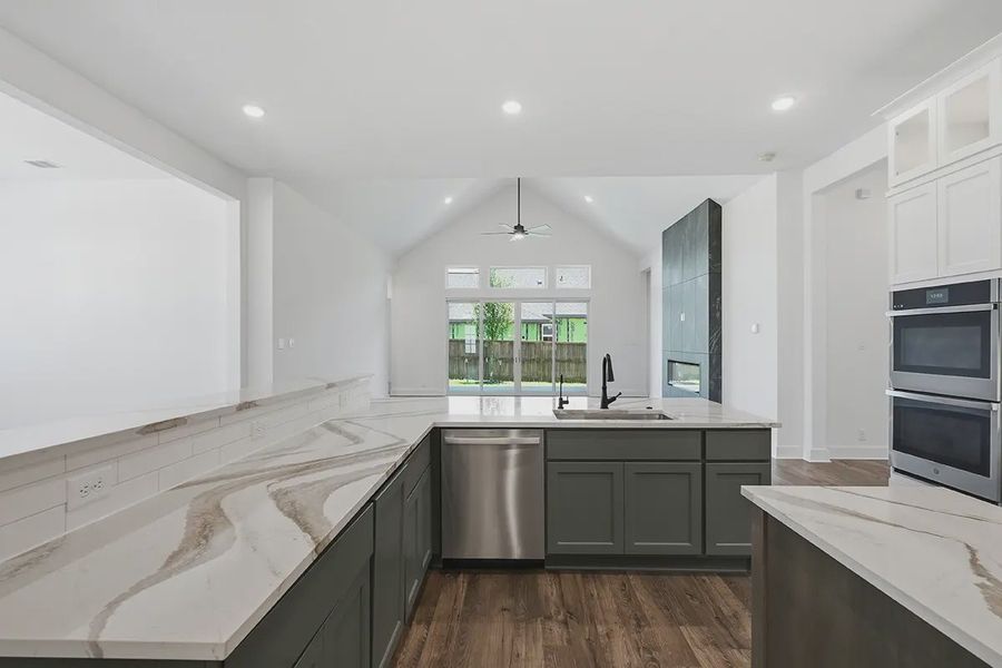 Representative furnished interior of a home built from the Kingston by Chesmar Homes in Prominence 60's, San Antonio (Image 11).