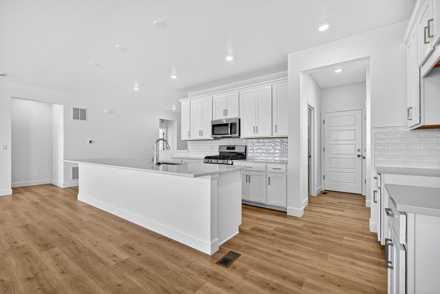 Furnished interior view inside a new home in Trailstone City Collection, Arvada (Image 7).