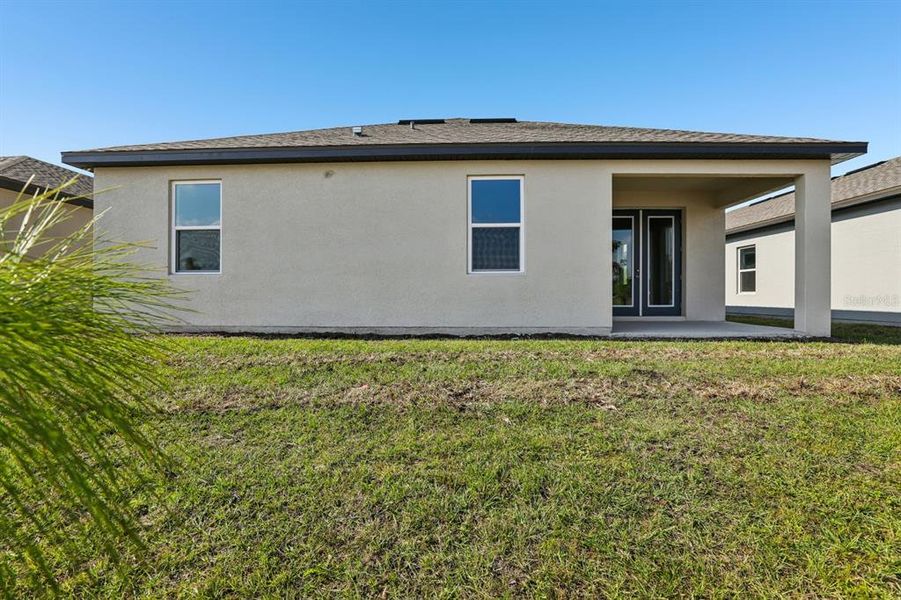 Exterior details and patio area of a home in Hawks Run, Kissimmee (Image 17). Exterior details and patio area of a home in Hawks Run, Kissimmee (Image 17).