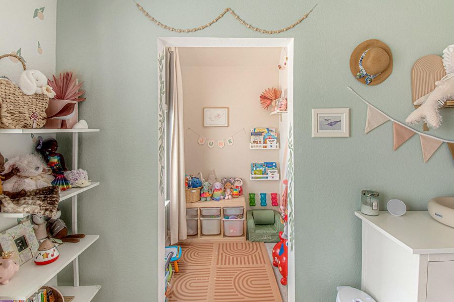 A small bonus nook connected to one of the upstairs bedrooms offers a unique and flexible space for reading, playing, bonus closet, hobbies, etc.