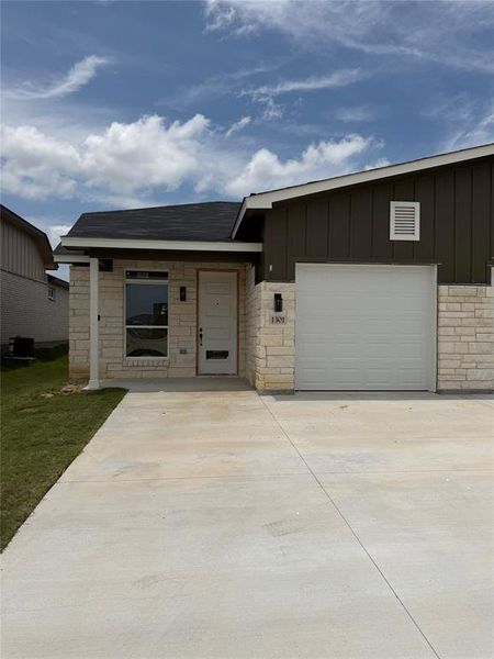 Front exterior of a new home in , Killeen, TX, highlighting curb appeal (Image 1). Front exterior of a new home in , Killeen, TX, highlighting curb appeal (Image 1).