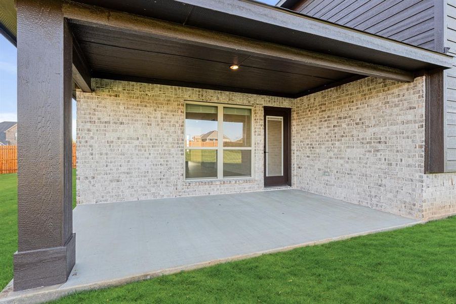 Exterior details and patio area of a home in Coyote Crossing, Godley (Image 3).