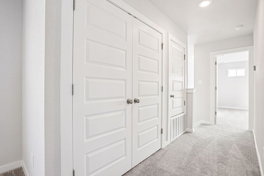 A room with white doors.