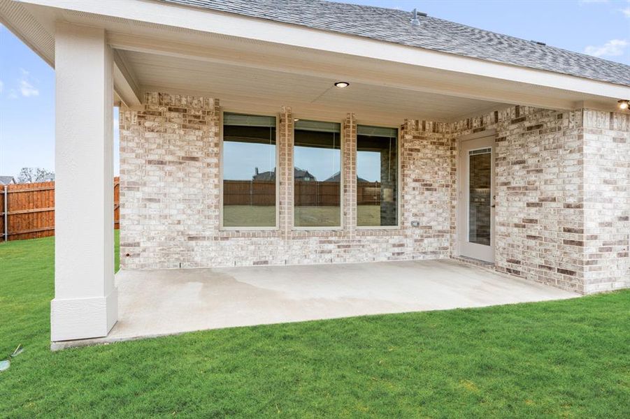 Exterior details and patio area of a home in Sunrise at Garden Valley, Waxahachie (Image 4).