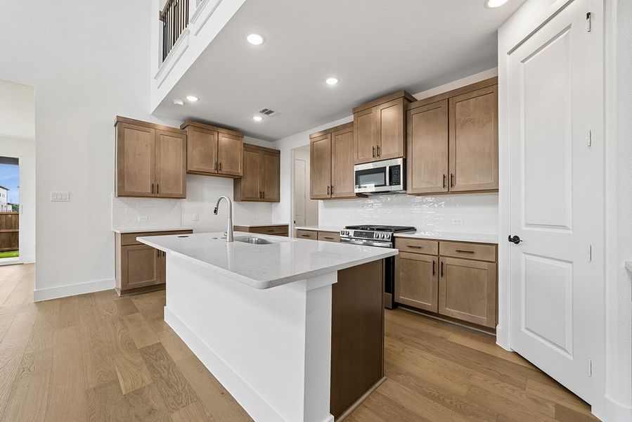 Representative furnished interior of a home built from the Ellis by Landon Homes in Fields - East Village, Frisco (Image 6).
