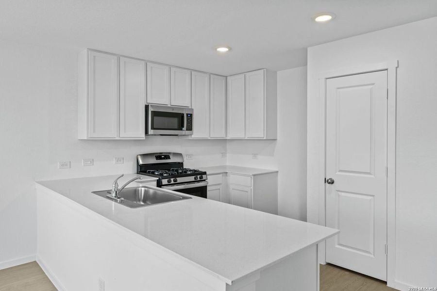 Furnished interior view inside a new home in Spring Grove, St. Hedwig (Image 8).
