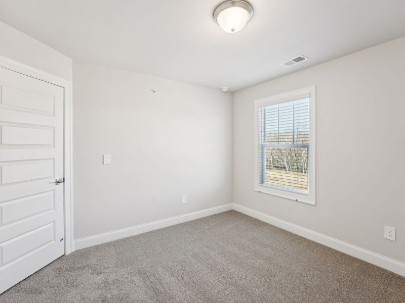 Spacious, unfurnished interior of a new home in Hemingway - Highland Series, Cumming (Image 16).