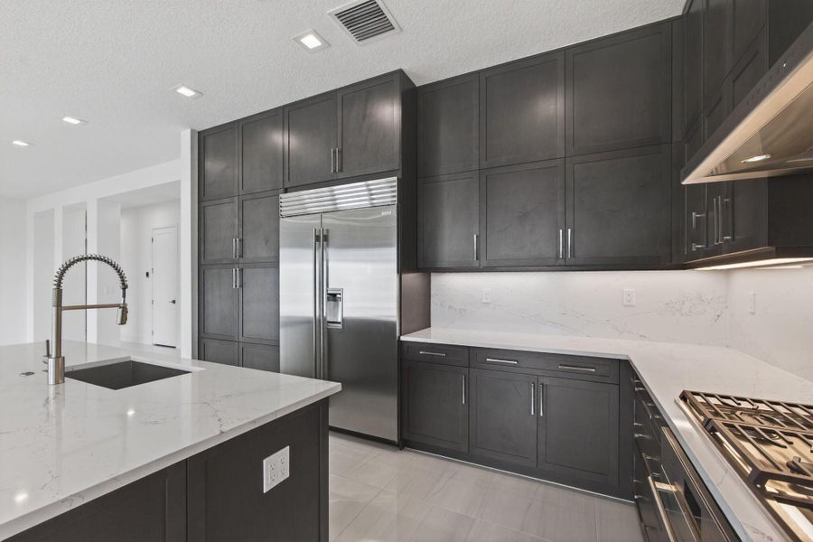 Furnished interior view inside a new home in Apex at Avenir, Palm Beach Gardens (Image 30).
