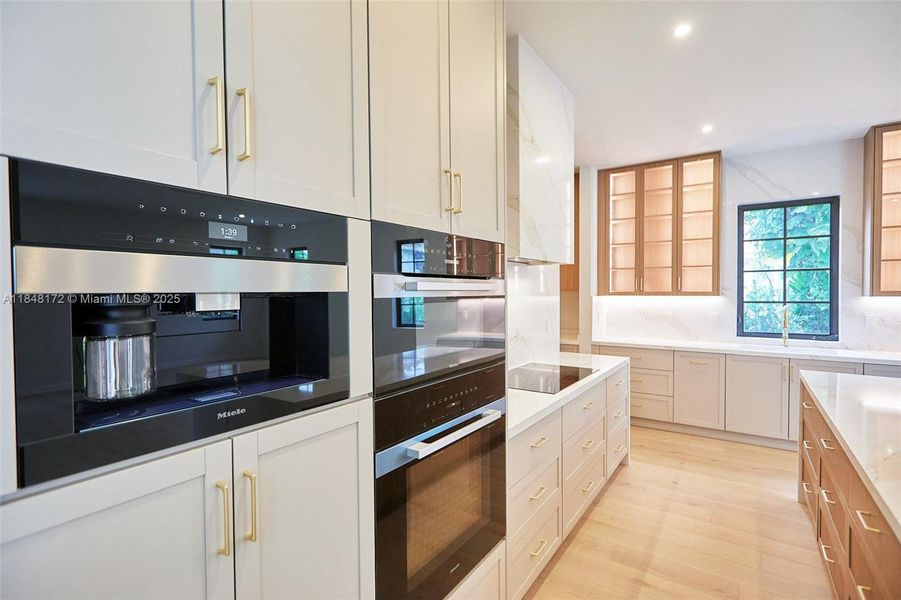 Furnished interior view inside a new home in , Coral Gables (Image 16).