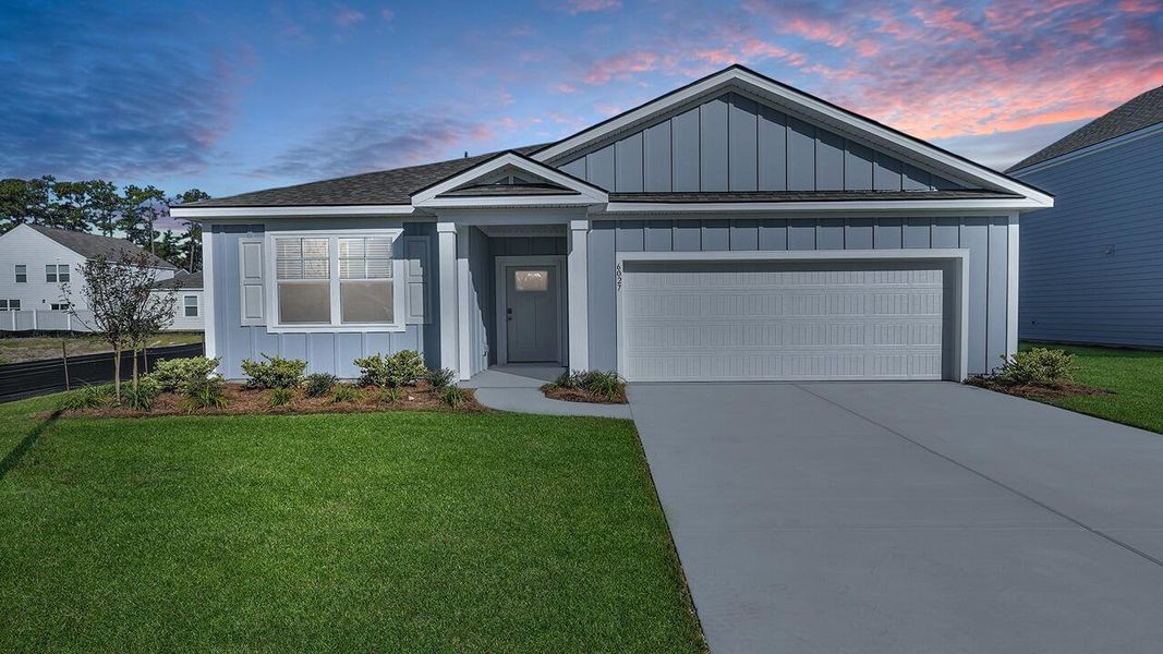 Front exterior of a new home in Hillcrest, Ravenel, SC, highlighting curb appeal (Image 1). Front exterior of a new home in Hillcrest, Ravenel, SC, highlighting curb appeal (Image 1).