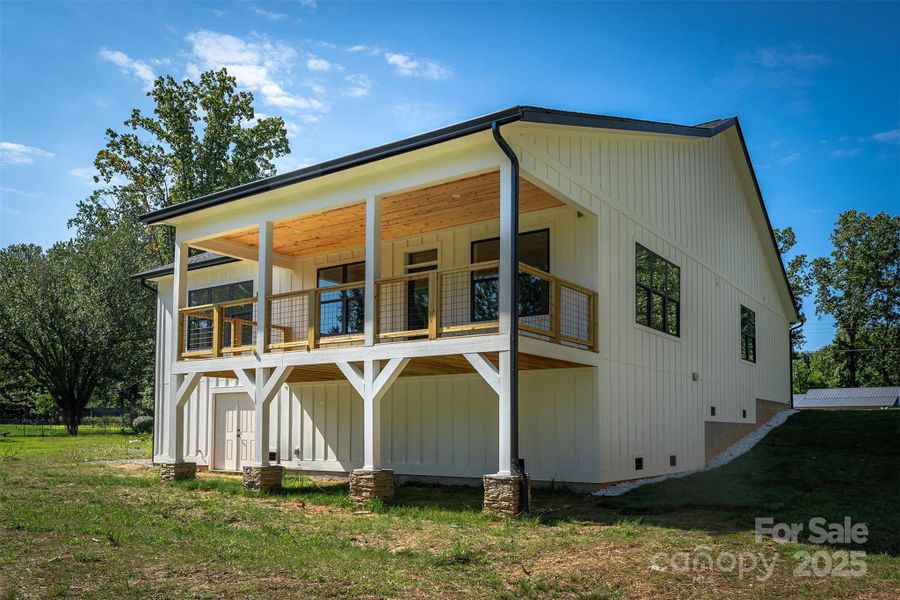 Front exterior of a new home in , Hendersonville, NC, highlighting curb appeal (Image 26).