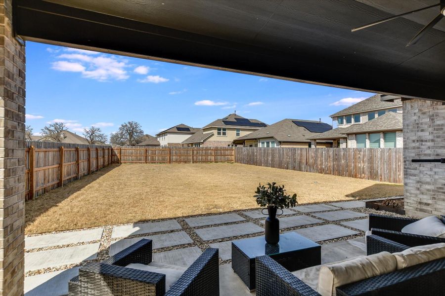 Large back yard with custom landscaping