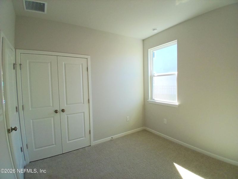 Spacious, unfurnished interior of a new home in Seminole Palms, Palm Coast (Image 9).