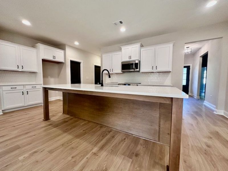 Furnished interior view inside a new home in Deer Creek, Moreland (Image 5).
