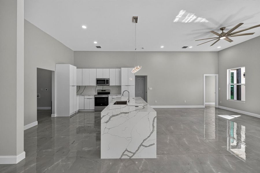 Furnished interior view inside a new home in , The Acreage (Image 12). Furnished interior view inside a new home in , The Acreage (Image 12).