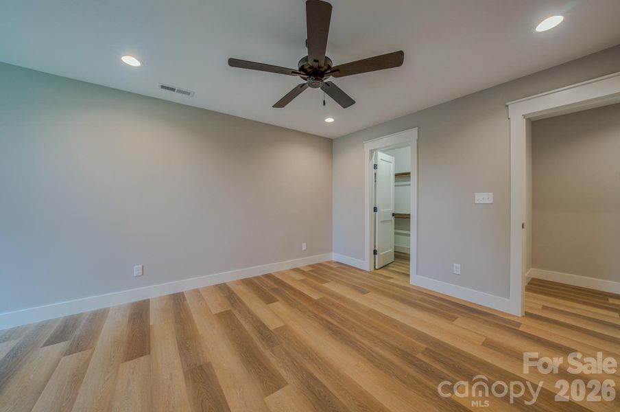 Upstairs bedroom 2 with walk in closet.