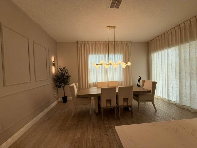 Furnished interior view inside a new home in Parkview Reserve, Orlando (Image 48).